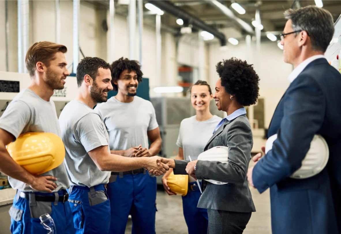 An FSG crew meeting with a client representative on site